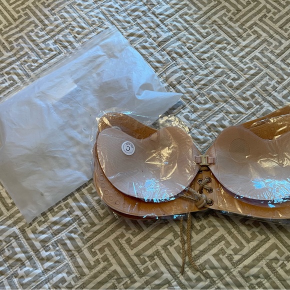 Nude/tan in color. Backless, strapless push up bras with silicone. - Picture 3 of 4